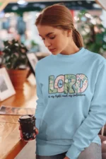 Women-sweatshirt-The-Lord-is-my-Light-and-my-salvation-Baby-Blue 751739351163.png