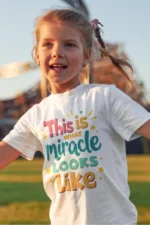 This Is What a Miracle Looks Like – Kids’ Christian Bible Verse Printed T-Shirt